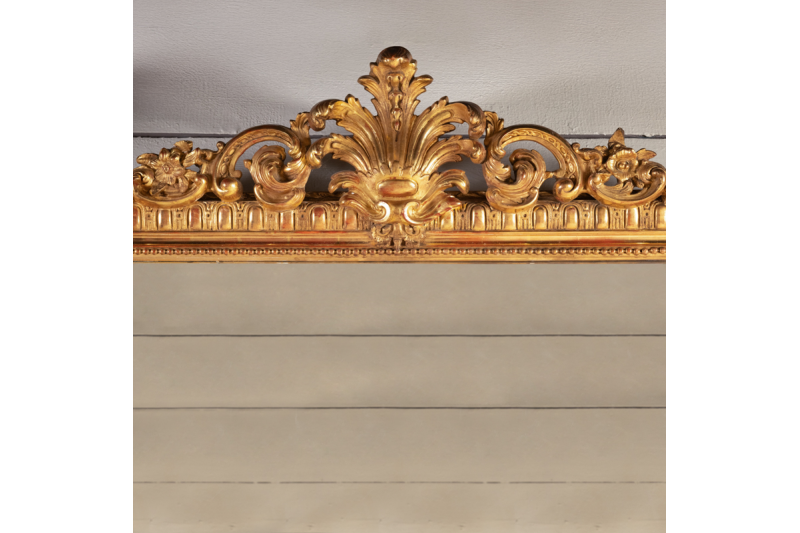 Very large 19th century French mirror in gilded and carved wood H. 200 cm