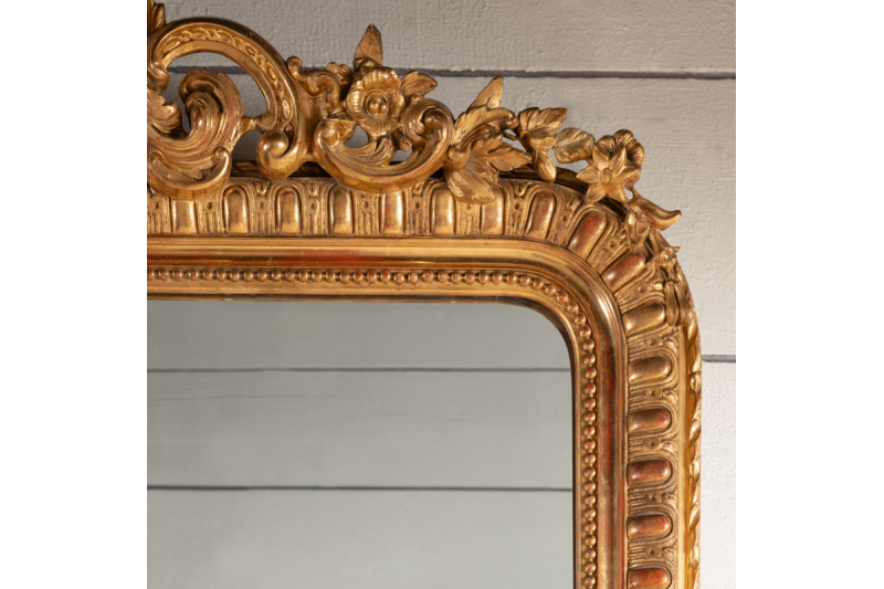 Very large 19th century French mirror in gilded and carved wood H. 200 cm